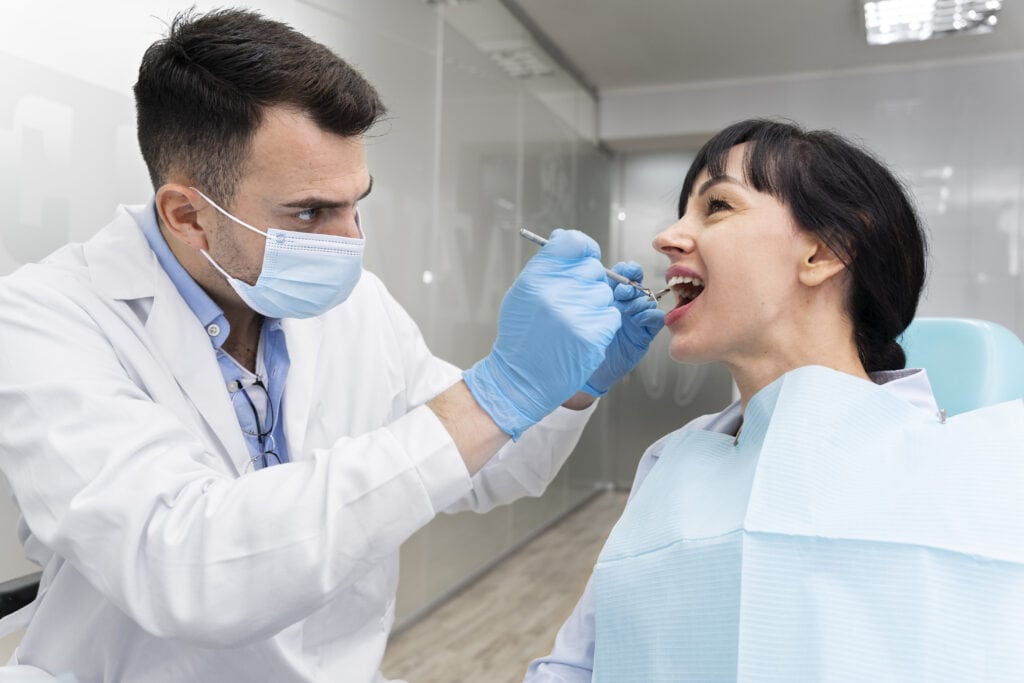 dentist doing check up patient